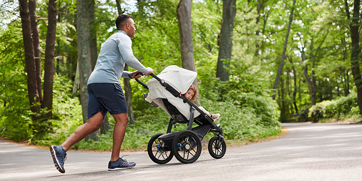 Male running with UPPAbaby RIDGE stroller