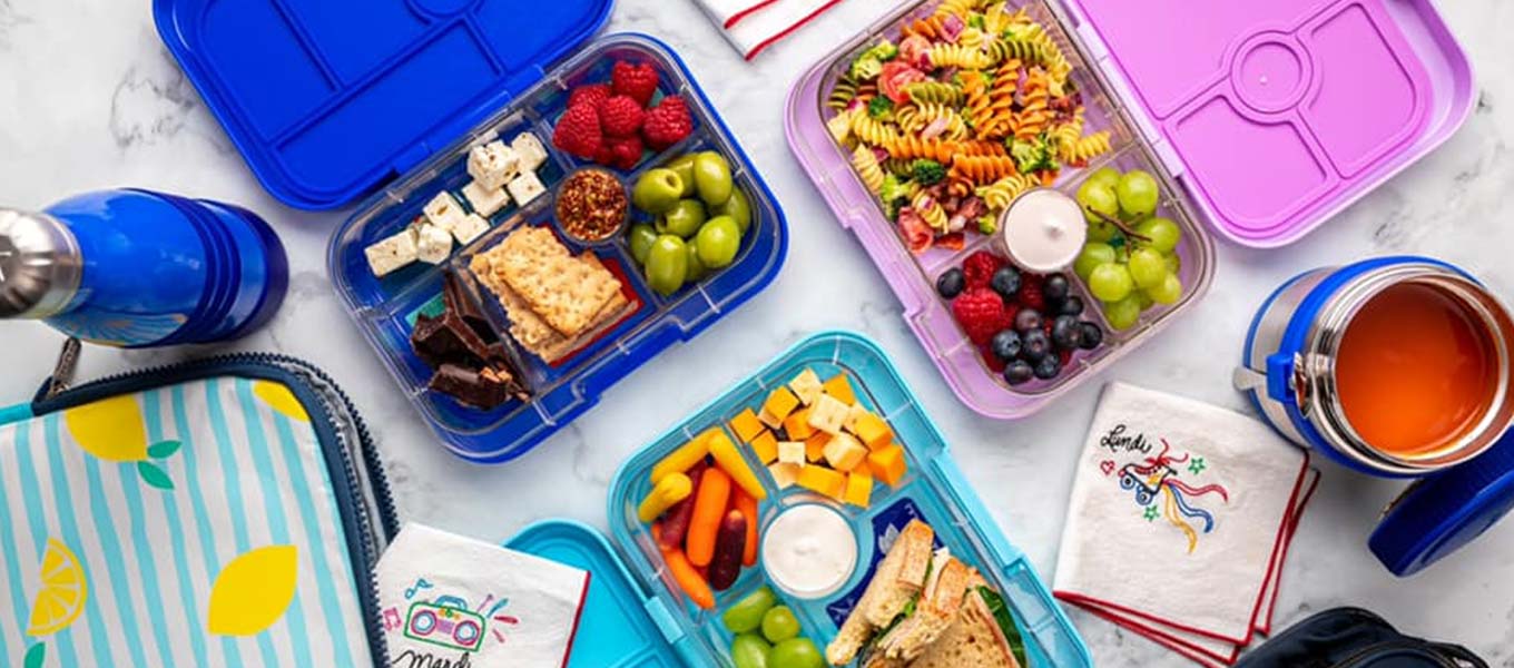 yumbox bento boxes filled with healthy food