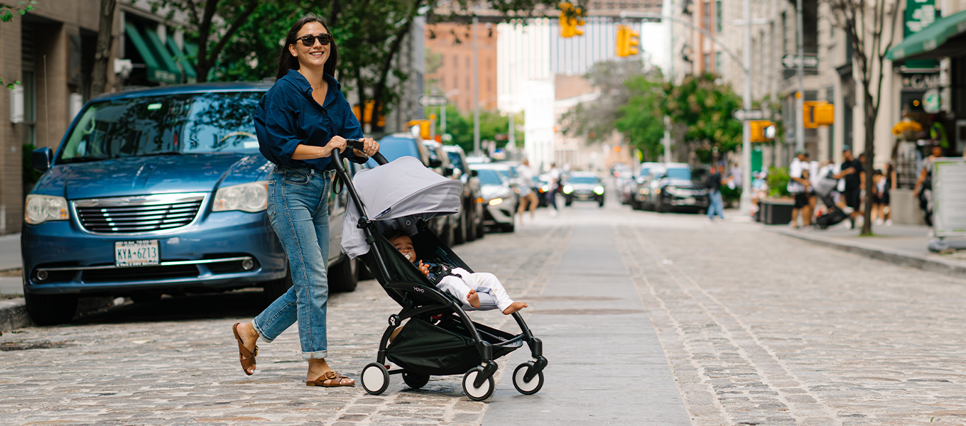 woman walking with stroller