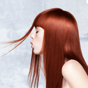 woman with red hair profile view