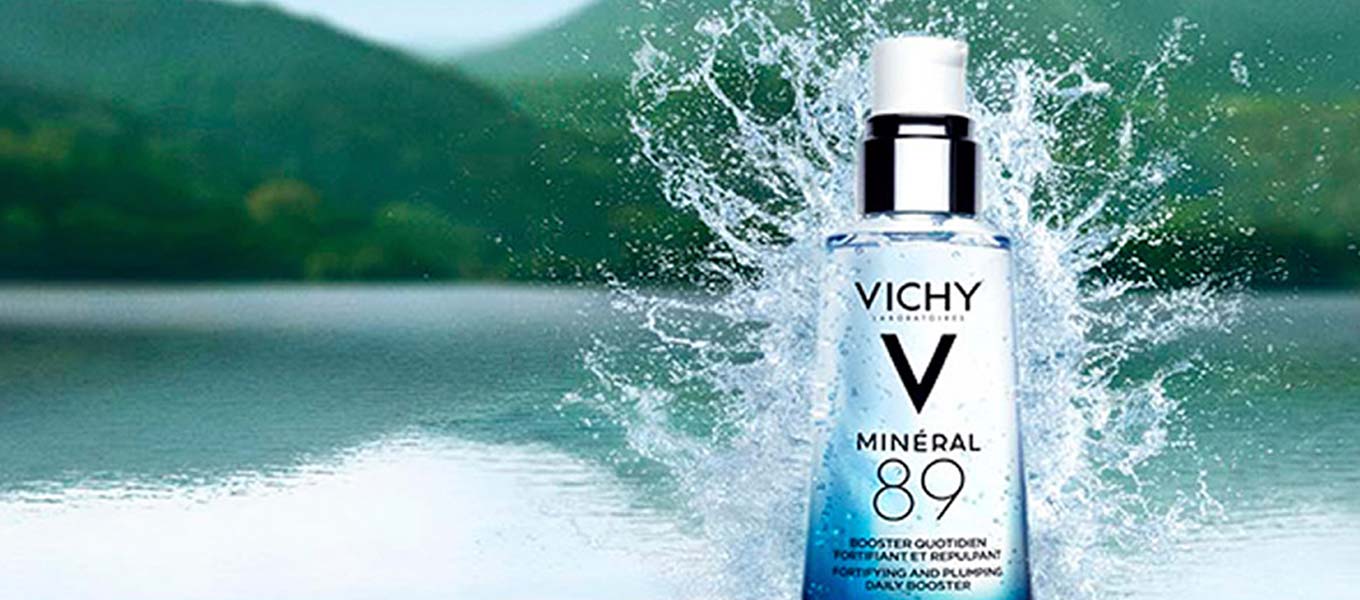 vichy product with water splashing in background