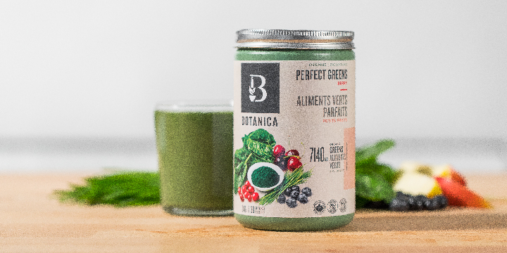 Botanica Perfect Greens product with green smoothie in the background
