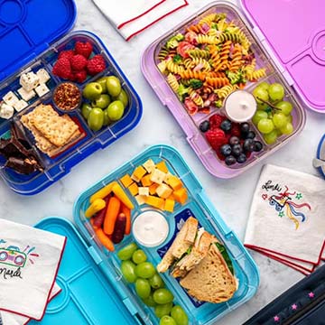 yumbox bento boxes filled with healthy food
